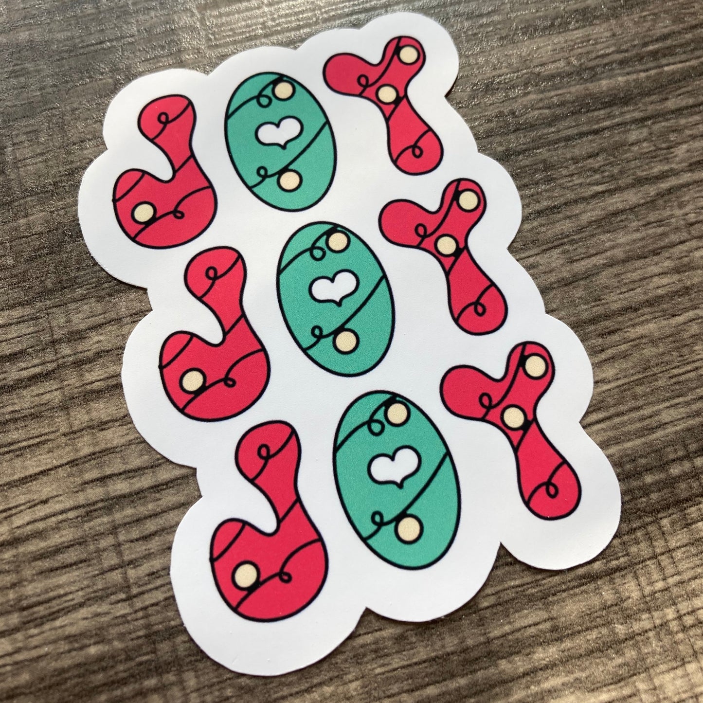 “Joy” sticker (red/green)