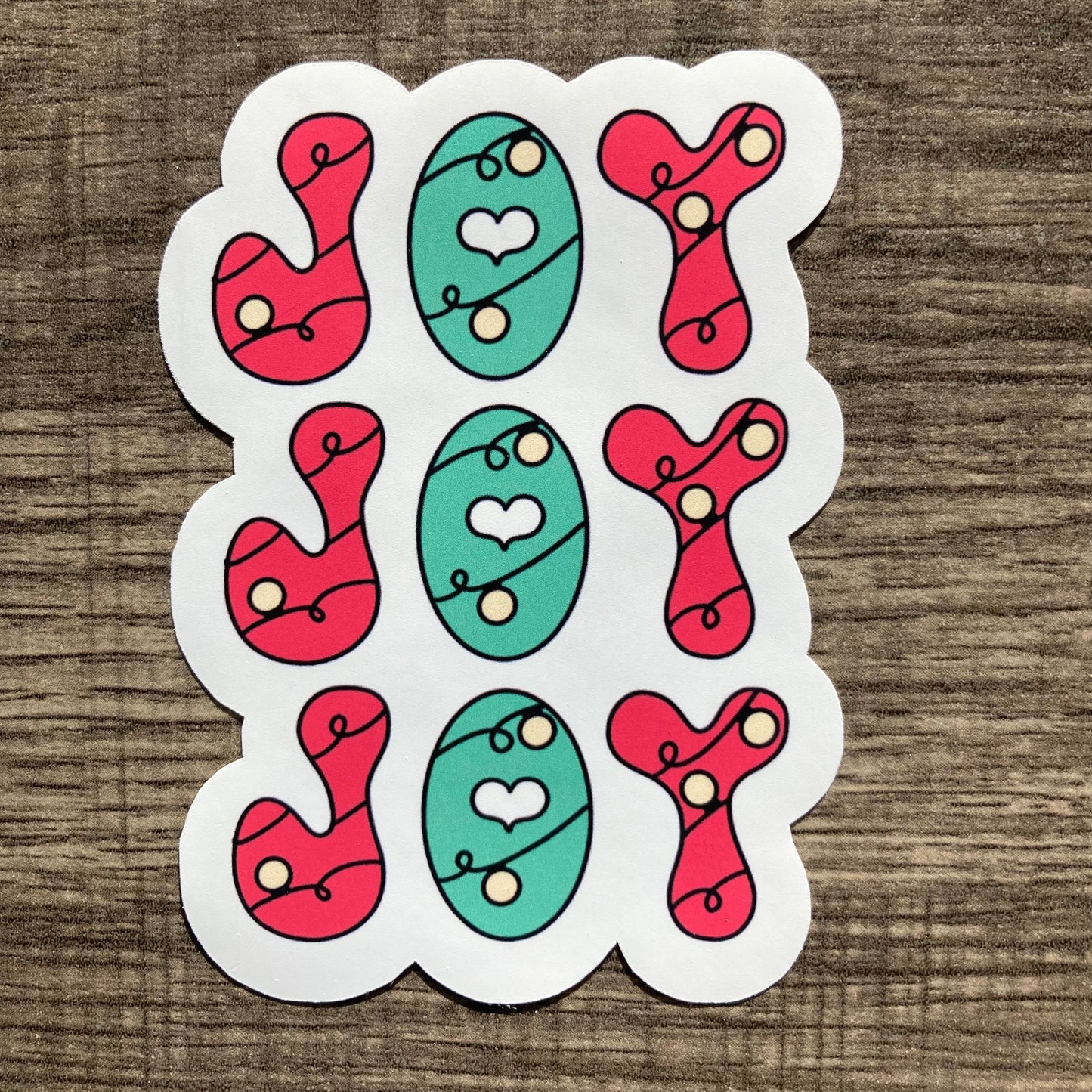 “Joy” sticker (red/green)